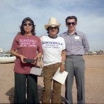 Two Native Americans pose for photograph with NASA engineer.