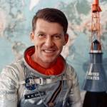 Walter Schirra, Mercury 7 astronaut poses with a model of his Sigma 7 capsule.