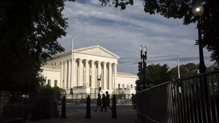 Pedestrians walking past the U.S. Supreme Court