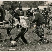 Riot police play a game of soccer with youths in Nyanga on 27 August 1976