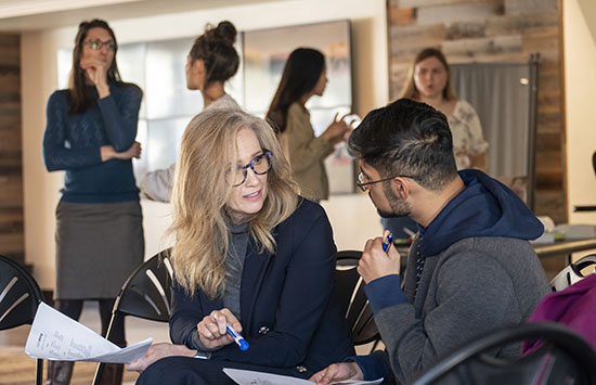 mentor talking with student