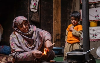 Hafiz Ur Rehman (right) next to his mother, is a beneficiary of the Central Asia Stunting Initiative (CASI) project run by Aga Khan Health Service Pakistan in Gilgit-Baltistan