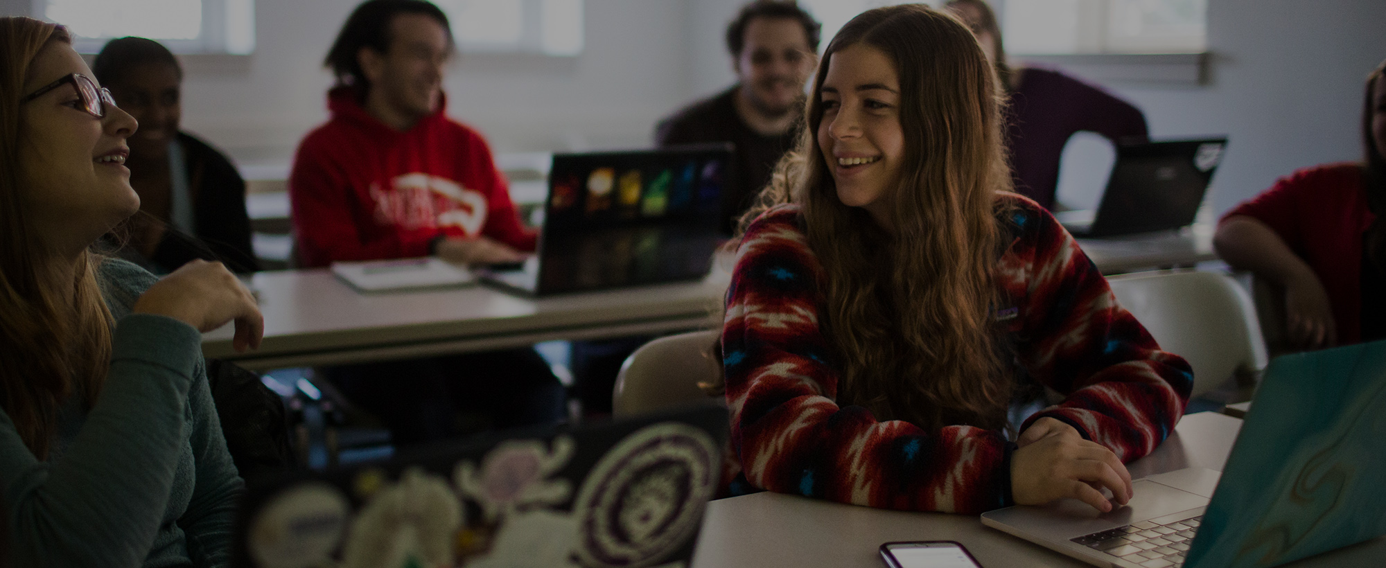 Students at their computers in a classroom