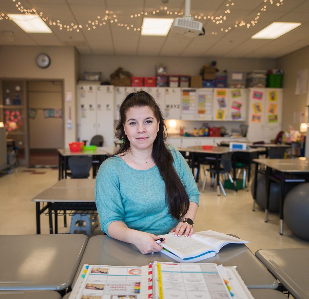 Student sitting at a classroom desk