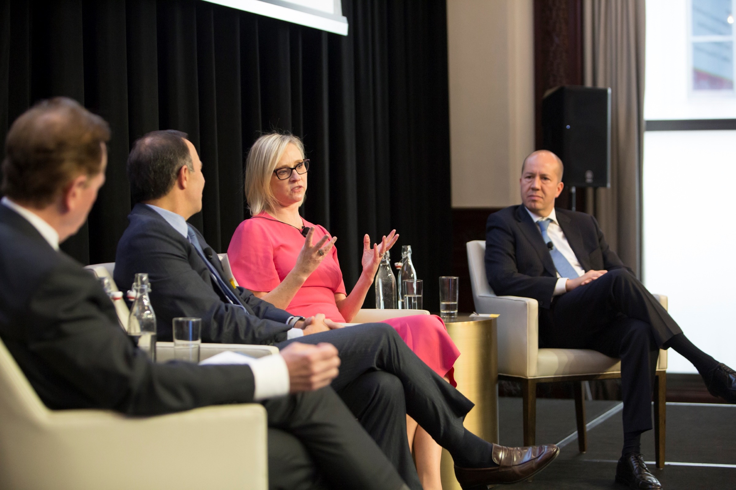 Board members discussing in chairs