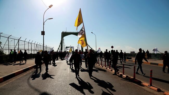 Поддерживаемые Ираном Народные народные силы самообороны Ирака в Зеленой зоне, где находится правительство Ирака и посольство США, в Багдаде, Ирак 