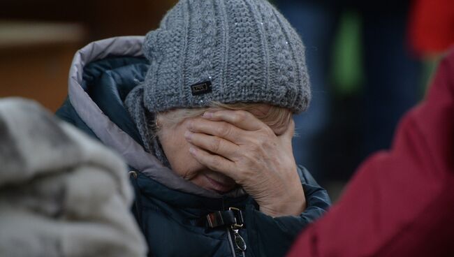 Родственница одного из пропавших без вести при пожаре в торговом центре Зимняя вишня в Кемерово. 26 марта 2018