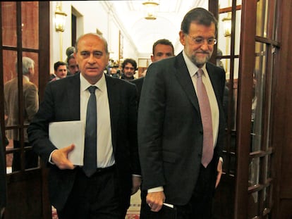 Jorge Fernández Díaz y Mariano Rajoy, en el Congreso en 2012.