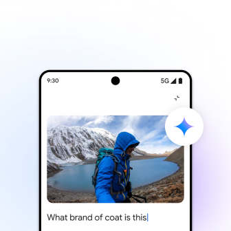 A phone screen showing a person in a coat standing by a lake, mountains, with the text, 'What brand of coat is this' below the photo.