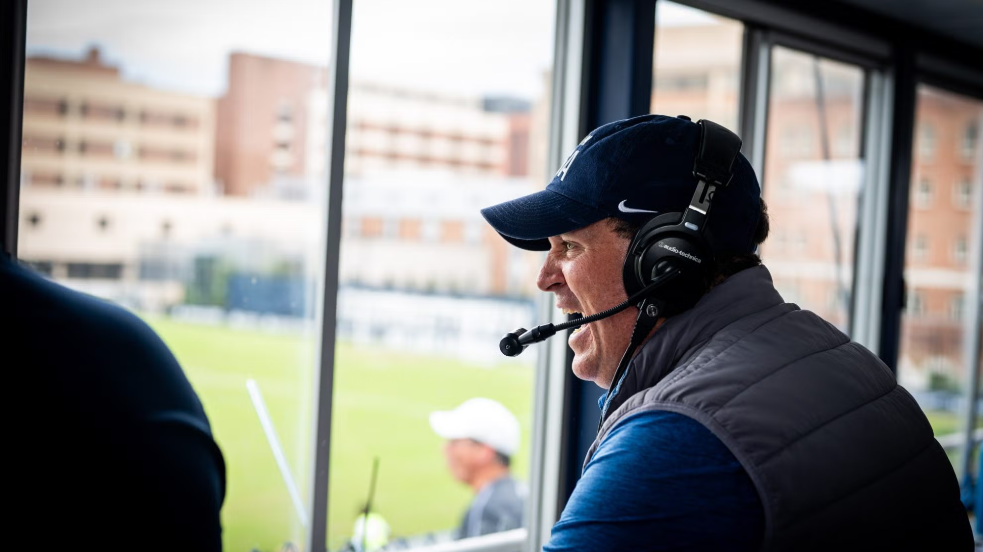 Dan Helfrich (MBA'99) in the press box above Georgetown's soccer field